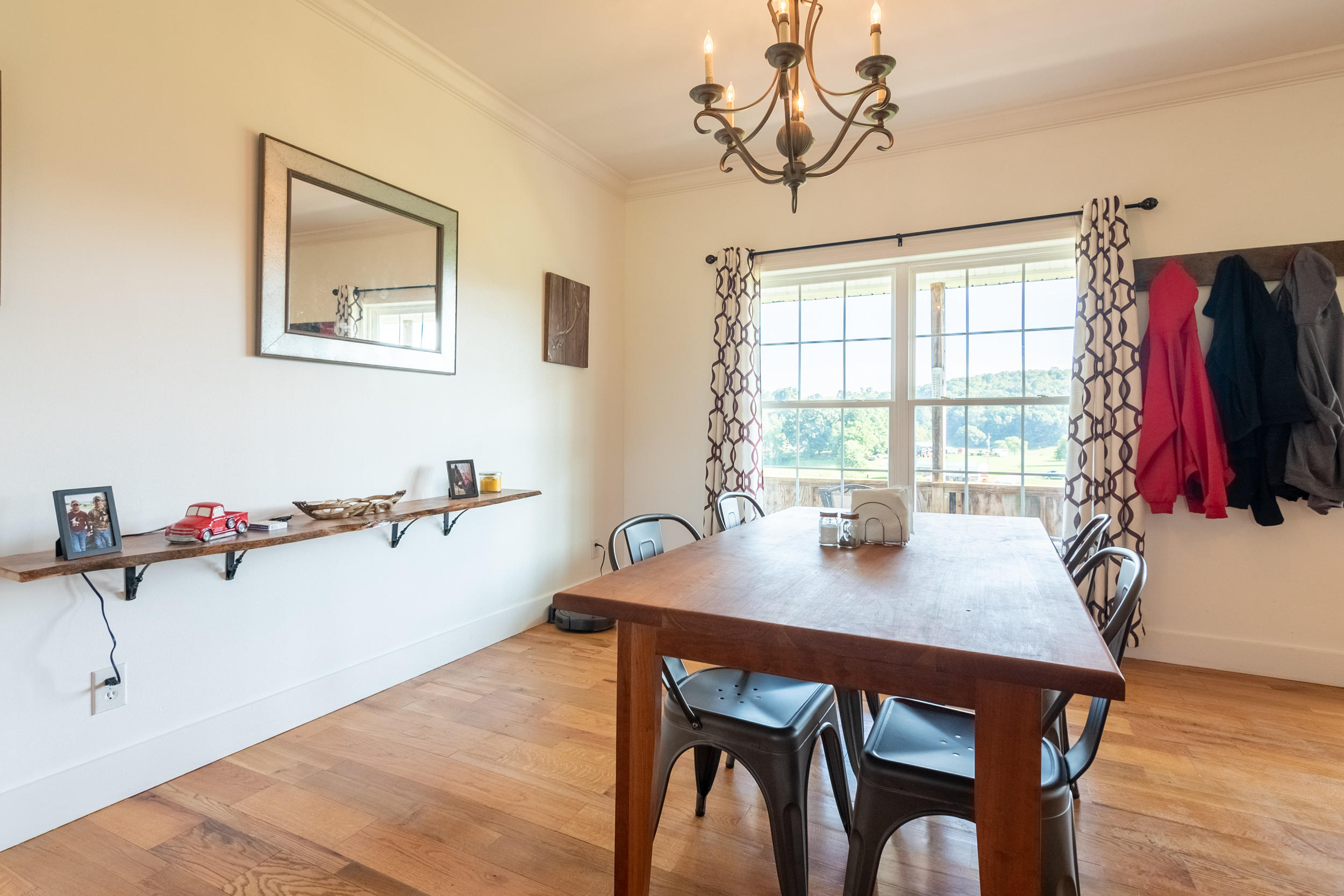 3850 Hopper Lane Riner, VA 24149 - Photo 31 of 50 a view of a dining room with furniture window and wooden floor