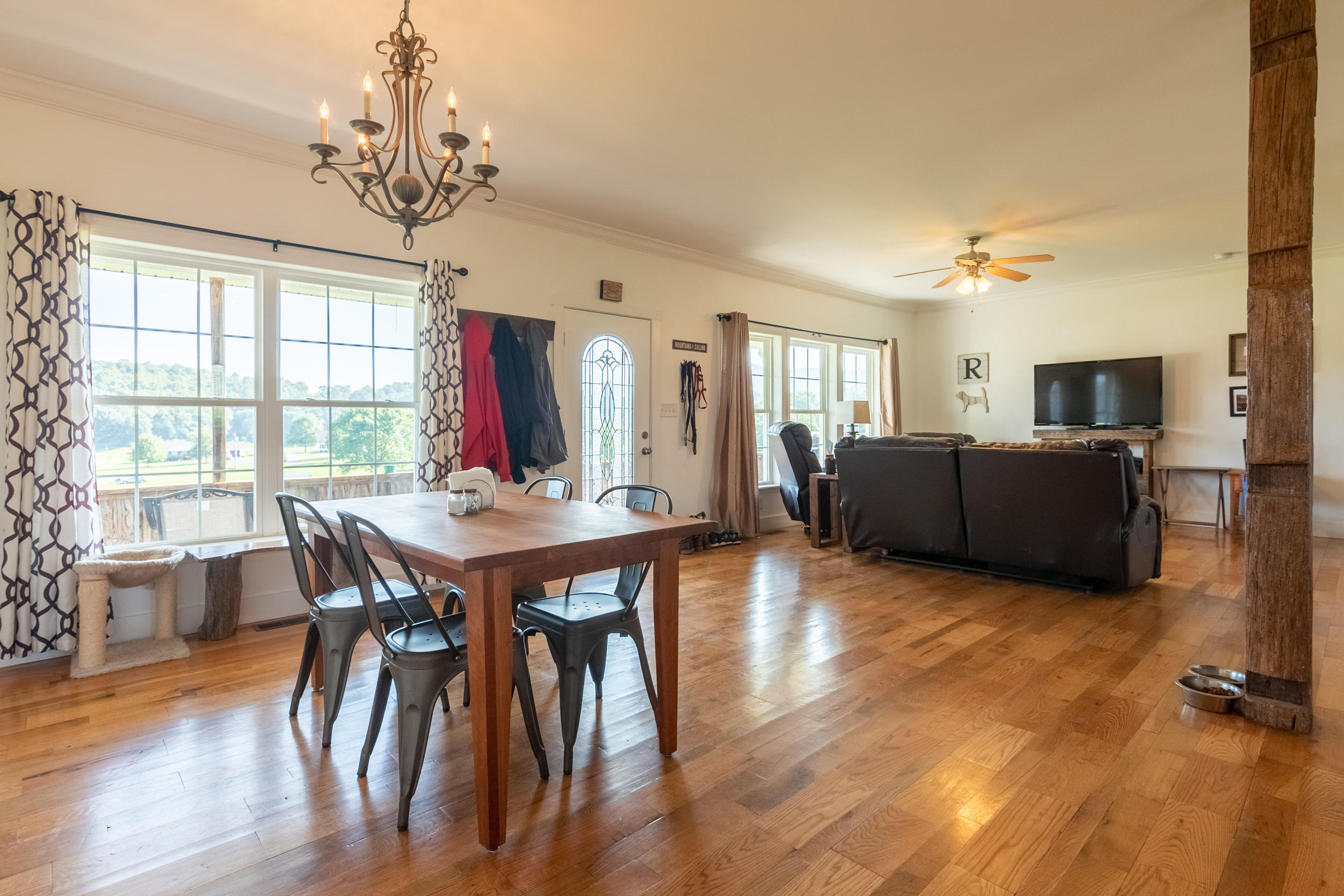 3850 Hopper Lane Riner, VA 24149 - Photo 32 of 50 a view of a dining room with furniture window and wooden floor