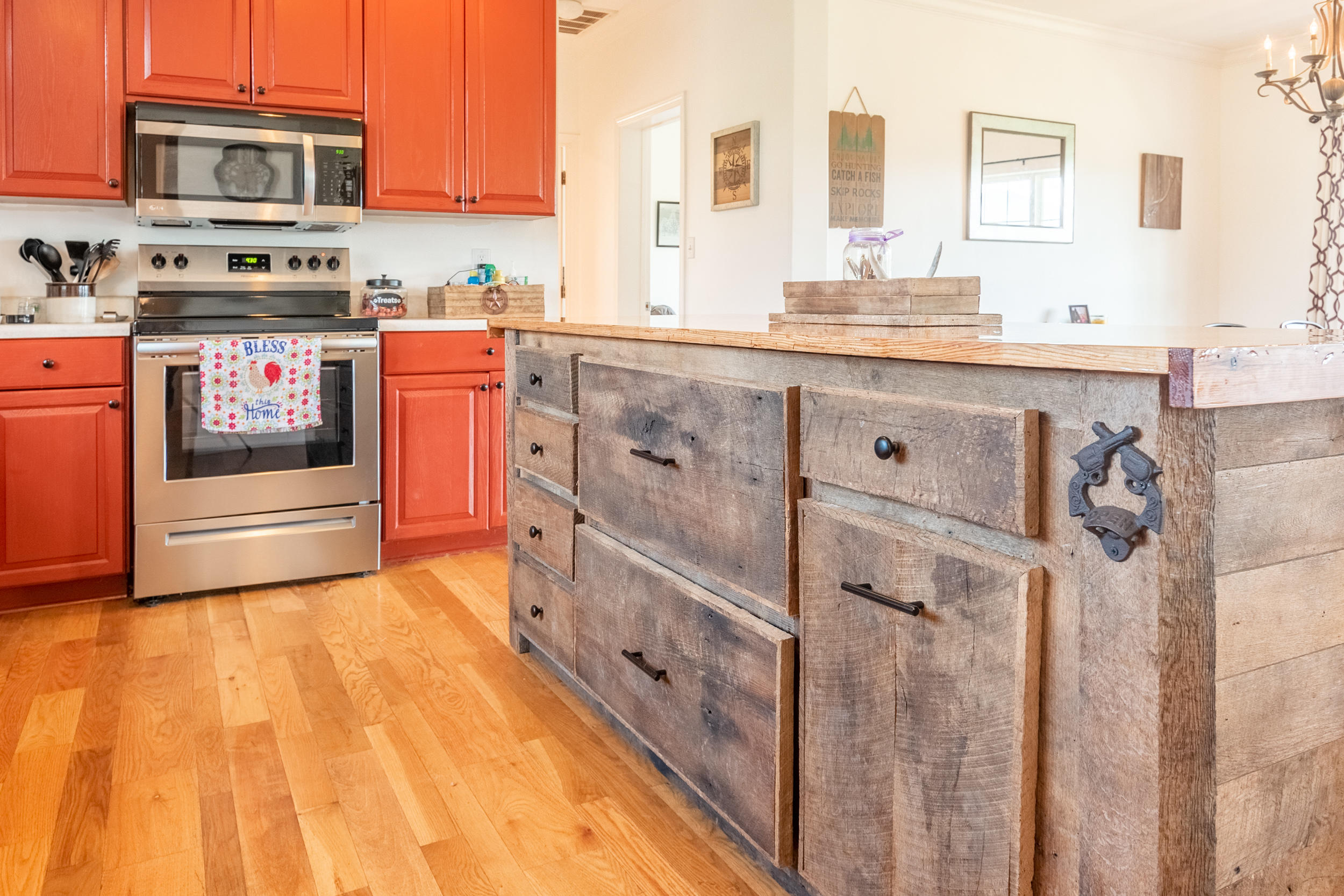 3850 Hopper Lane Riner, VA 24149 - Photo 36 of 50 a kitchen with stainless steel appliances a stove sink and cabinets