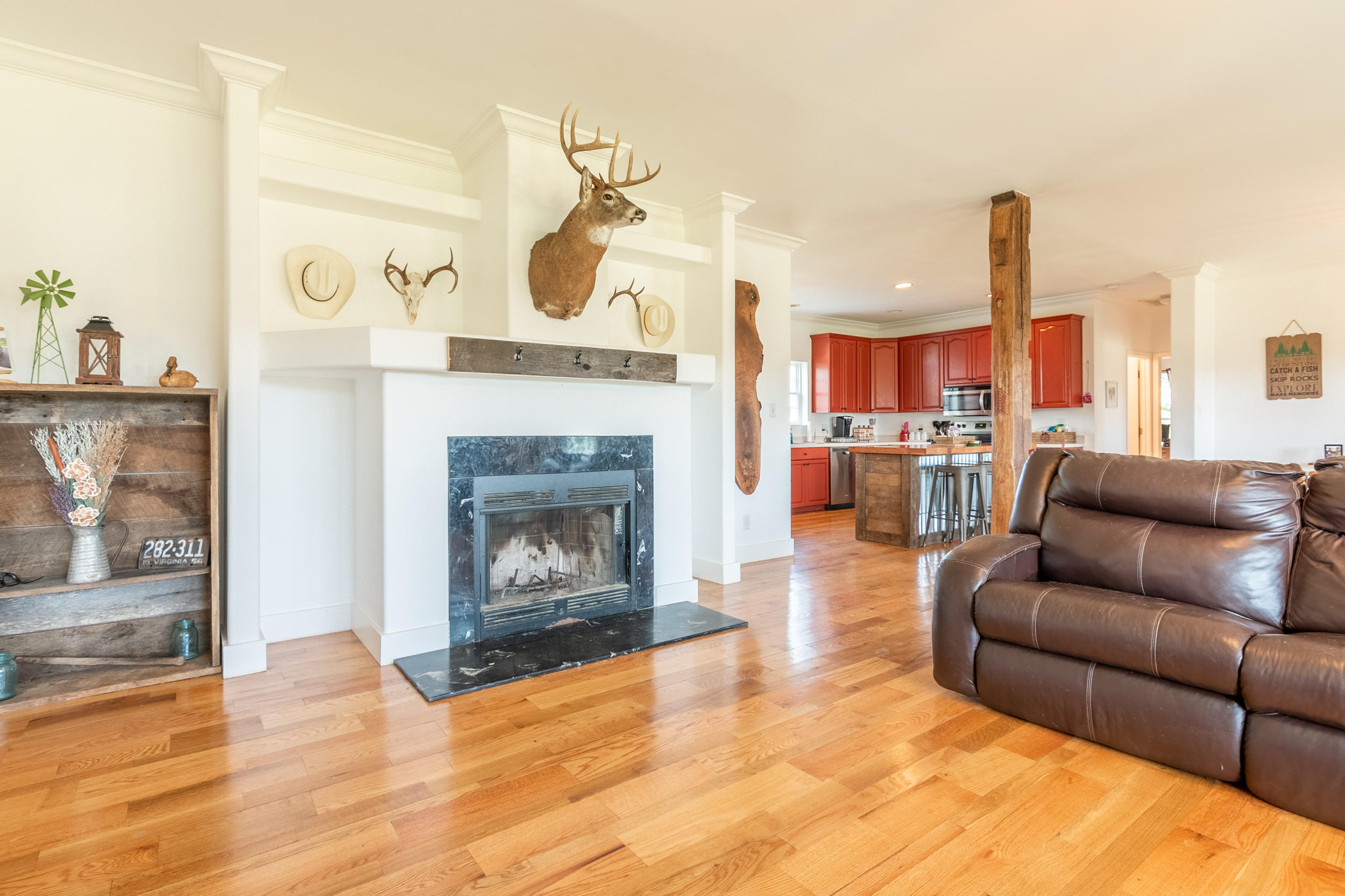 3850 Hopper Lane Riner, VA 24149 - Photo 42 of 50 a living room with furniture and a fireplace