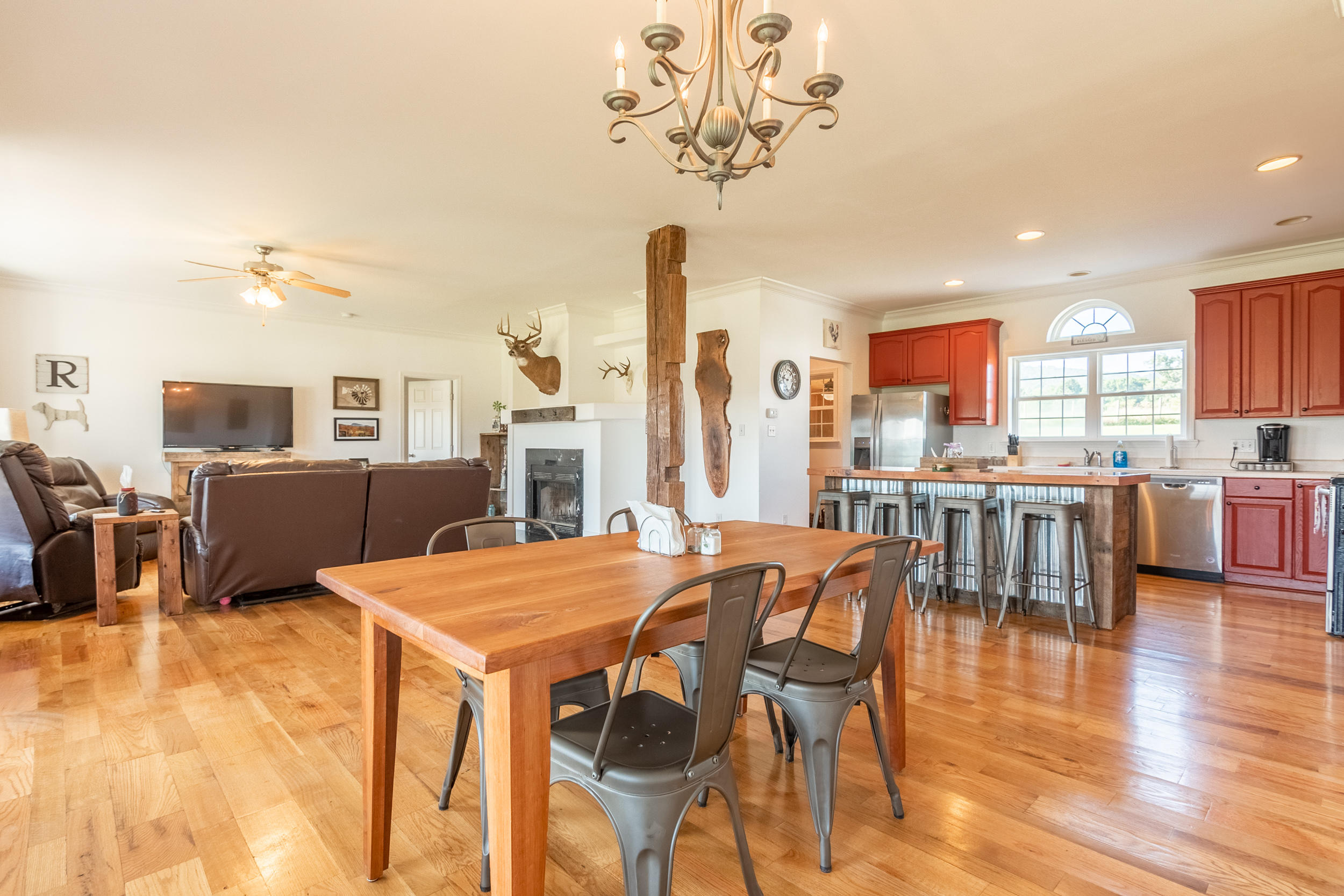 3850 Hopper Lane Riner, VA 24149 - Photo 43 of 50 a view of a dining room with furniture window and wooden floor