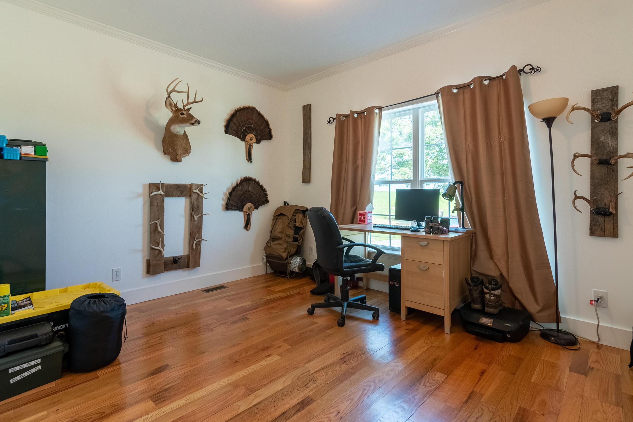 3850 Hopper Lane Riner, VA 24149 - Photo 46 of 50 a view of a workspace with furniture and a window
