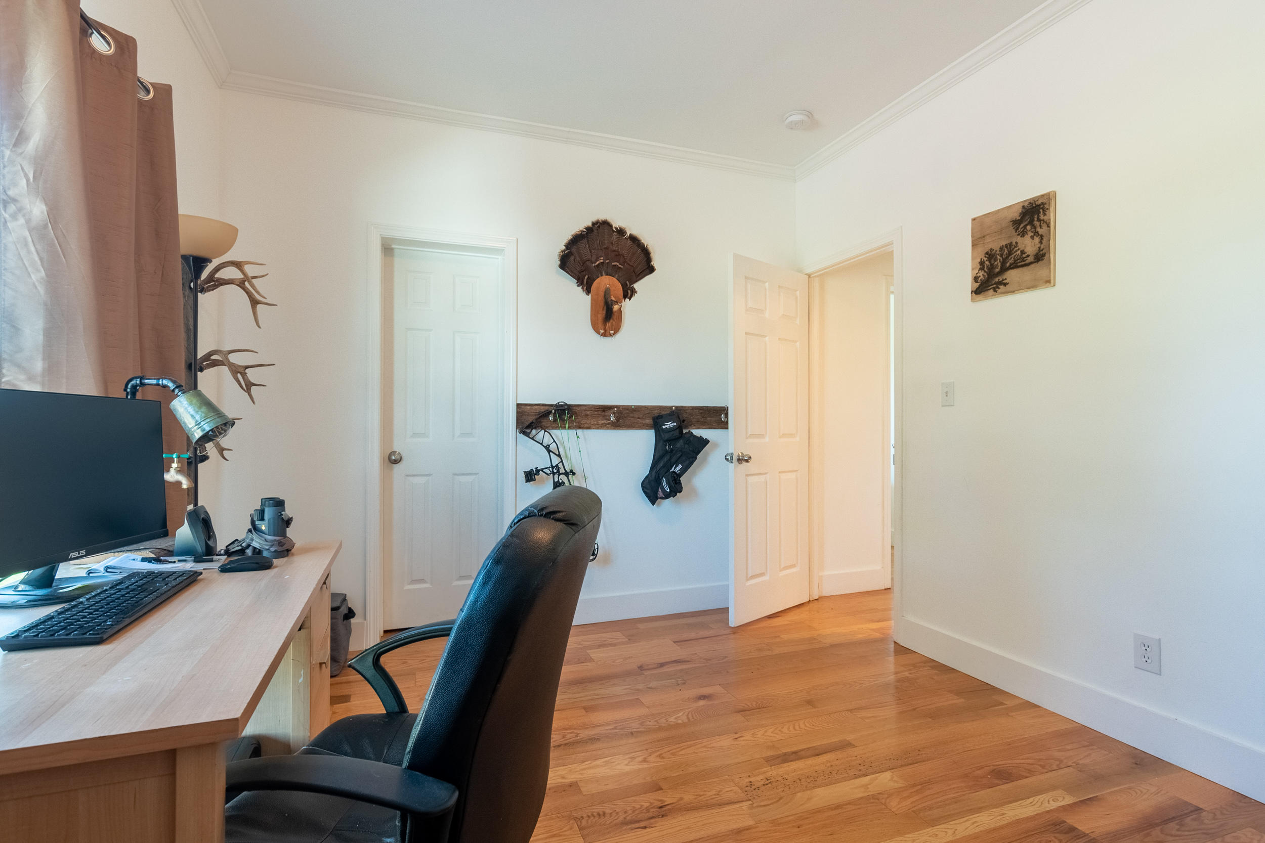 3850 Hopper Lane Riner, VA 24149 - Photo 47 of 50 a view of a workspace with furniture and wooden floor