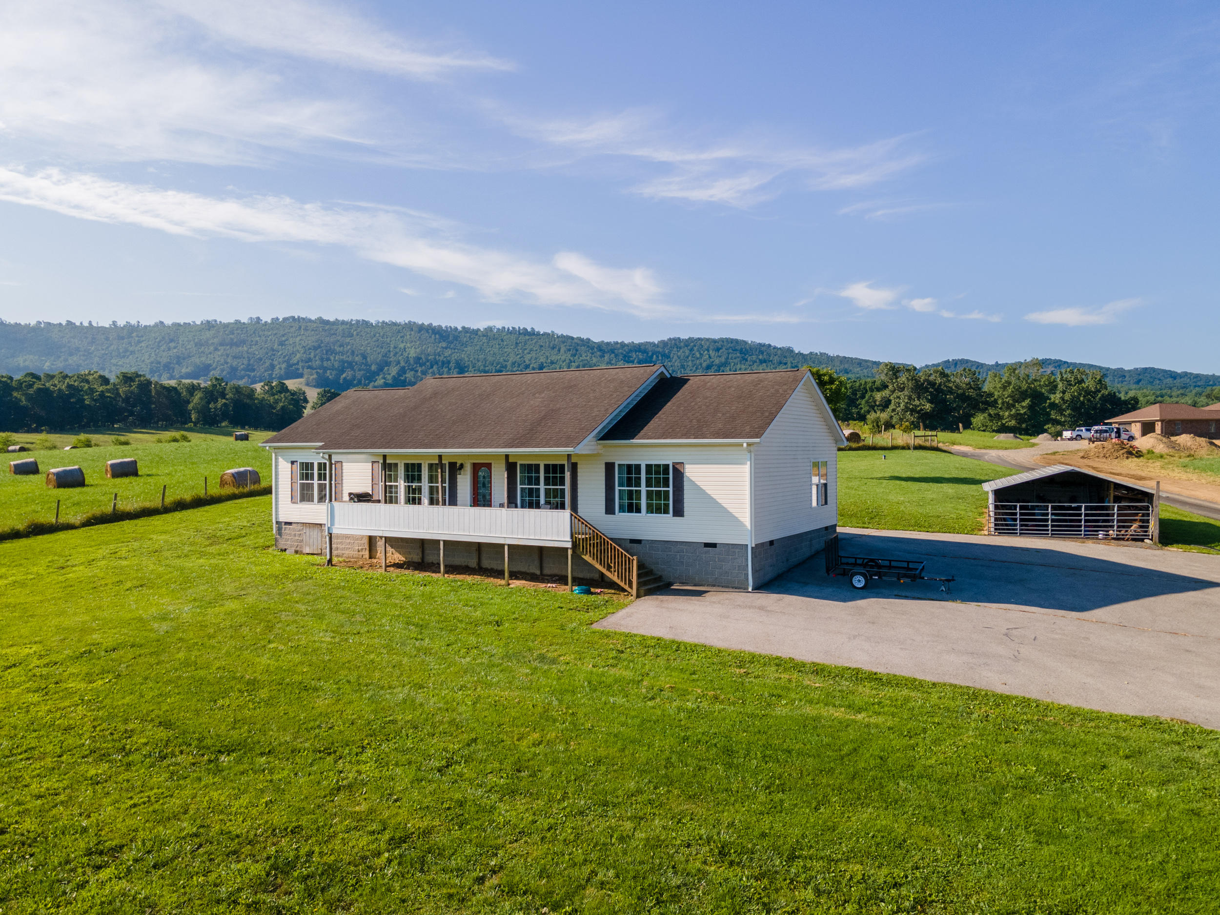 3850 Hopper Lane Riner, VA 24149 - Photo 7 of 50 an aerial view of a house with a big yard