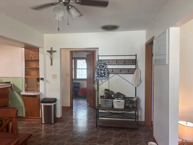 a bedroom with furniture and a window