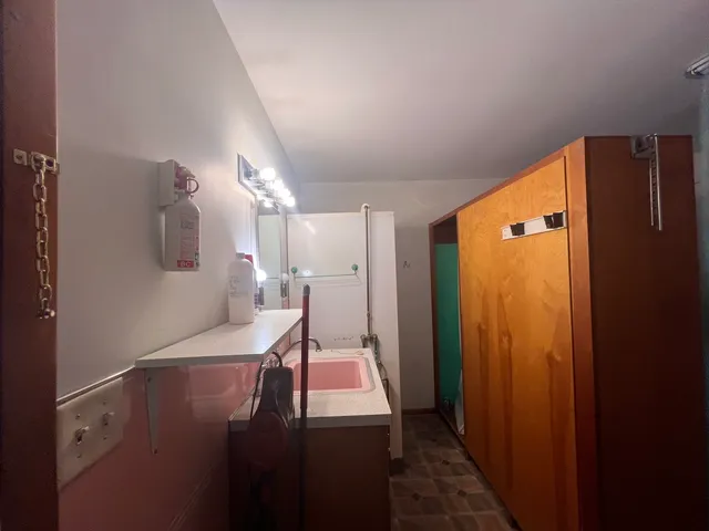 a view of a hallway with workspace