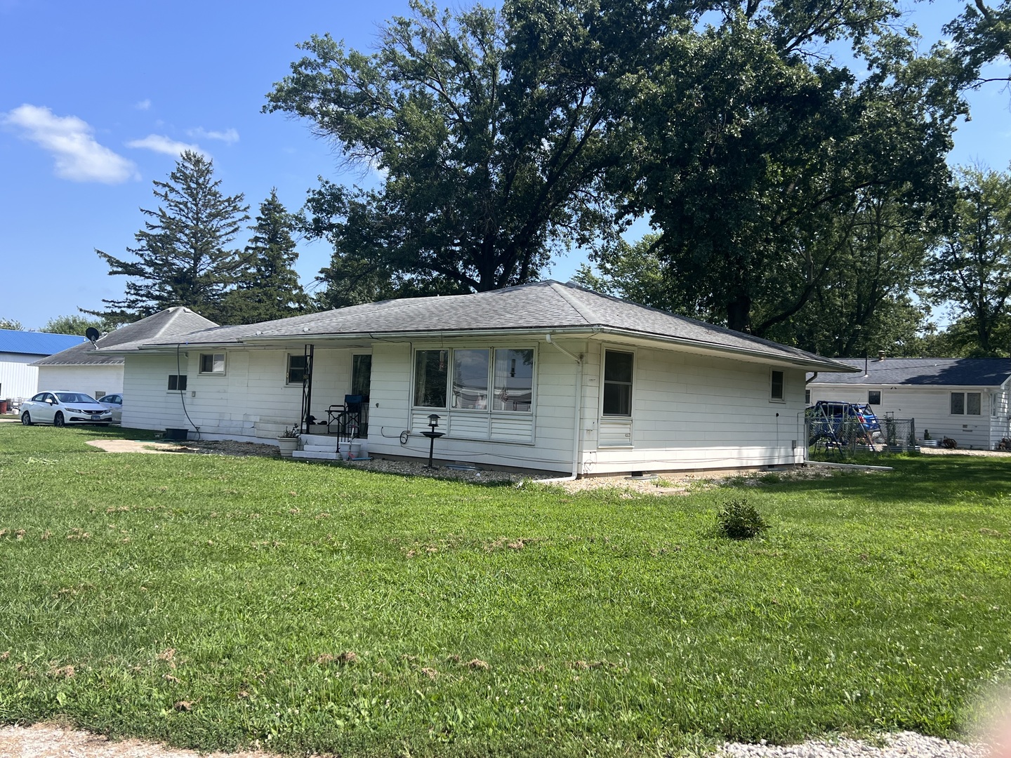 301 Dilks Street Roberts, IL 60962 - Photo 2 of 44 a front view of house with a garden
