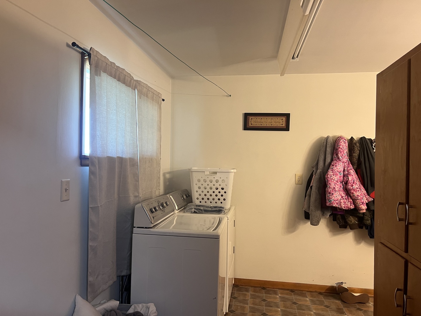 301 Dilks Street Roberts, IL 60962 - Photo 22 of 44 a view of walk in closet with clothes