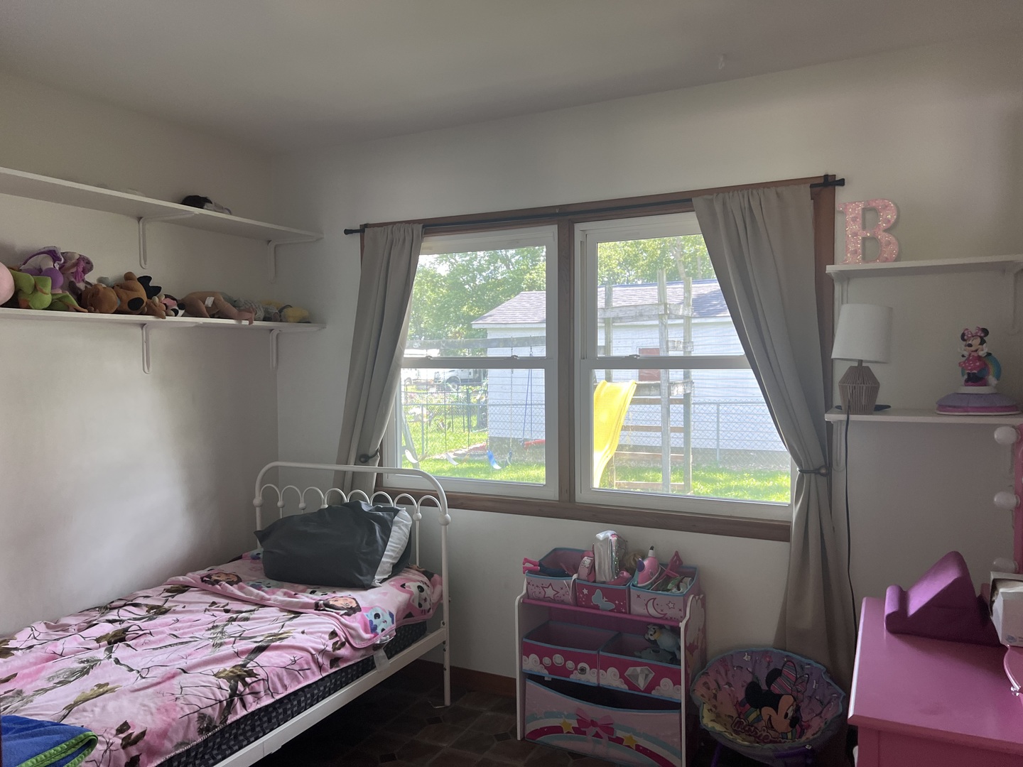 301 Dilks Street Roberts, IL 60962 - Photo 25 of 44 a bedroom with a bed and a window