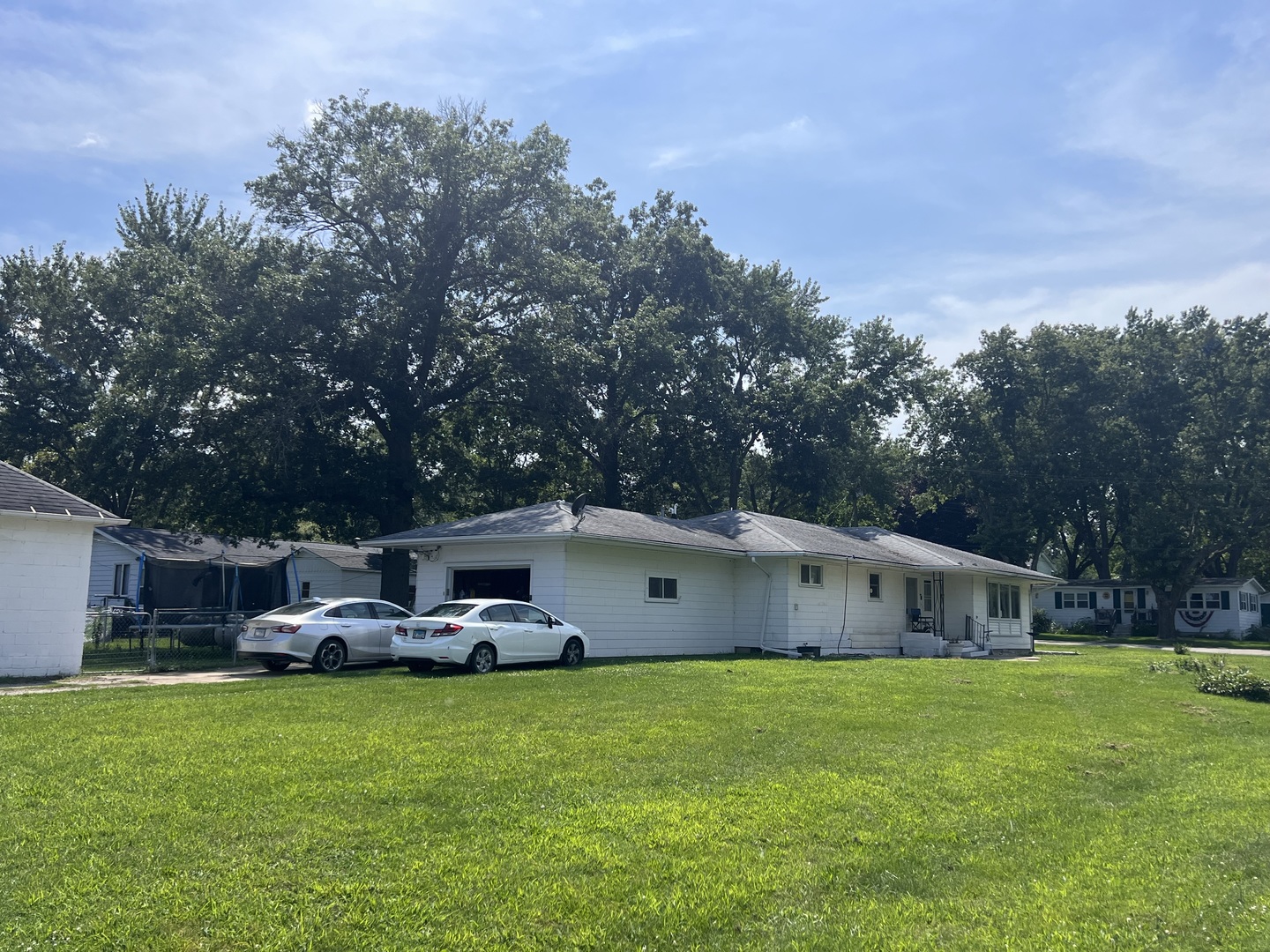 301 Dilks Street Roberts, IL 60962 - Photo 3 of 44 a view of a house with backyard and garden