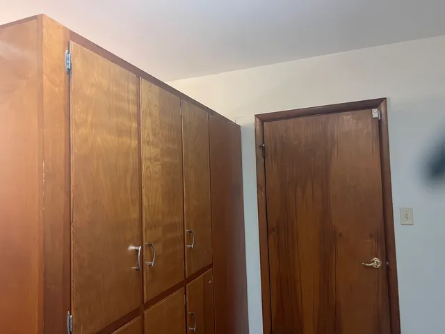 a bathroom with a shower and a shower