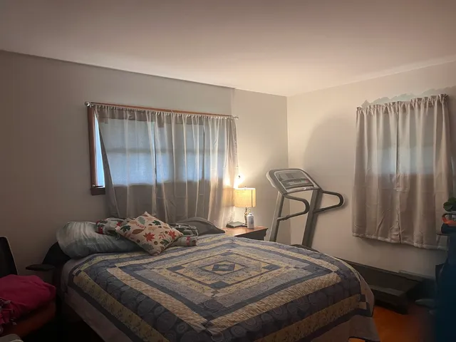 a bathroom with a sink a toilet and tub