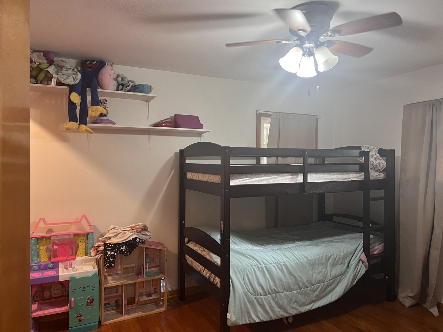 301 Dilks Street Roberts, IL 60962 - Photo 37 of 44 a bedroom with a bed and chandelier