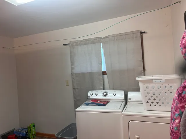 a bathroom with a shower and a shower curtain