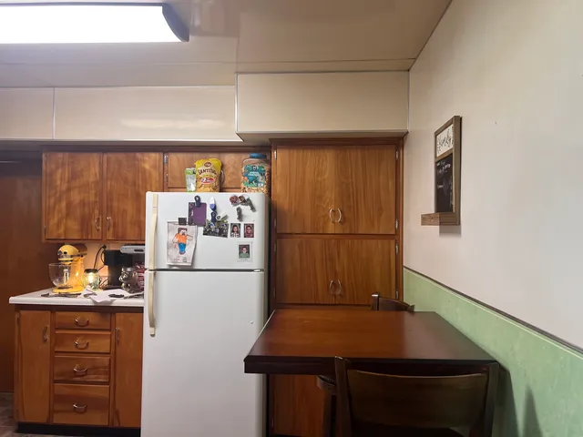 a room with furniture and a window