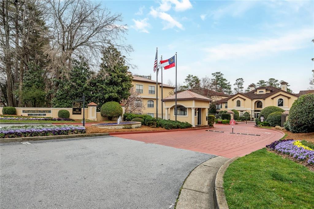 3777 Peachtree Road Northeast, Unit 725 Atlanta, GA 30319 - Photo 1 of 1 a view of street with houses