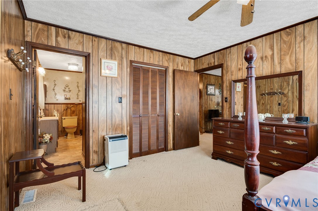 475 Dove Road Boydton, VA 23917 - Photo 24 of 45 a bed room with a bed and a dresser