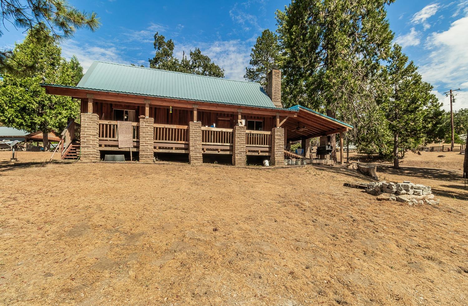 33288 Linson Road Tollhouse, CA 93667 - Photo 1 of 54 a view of a house with a patio