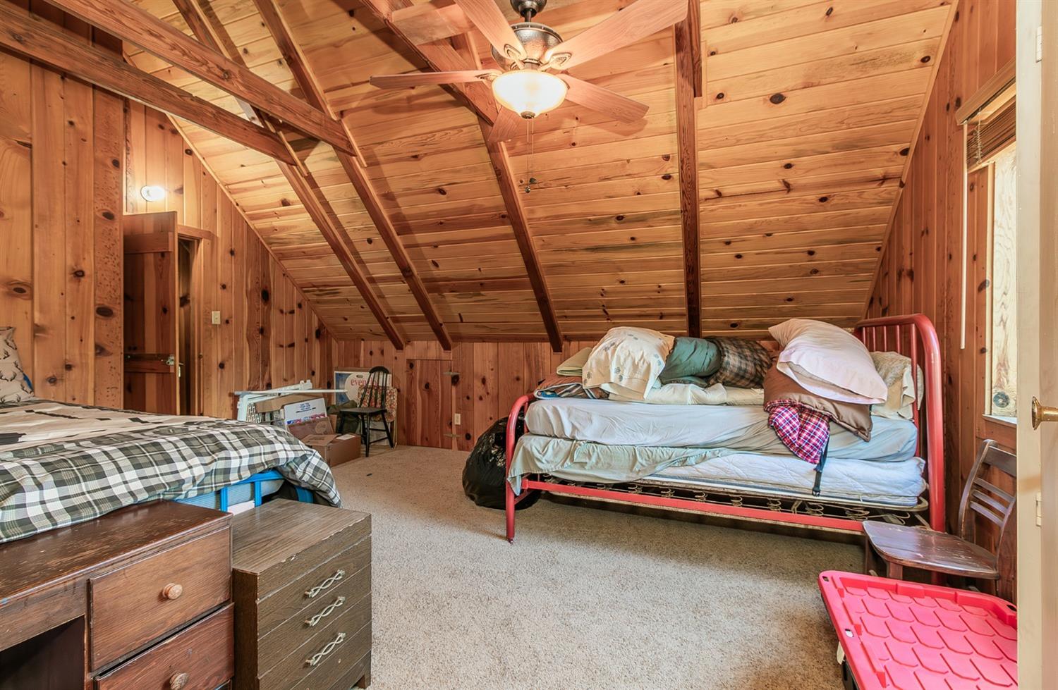 33288 Linson Road Tollhouse, CA 93667 - Photo 14 of 54 a bedroom with bed and window