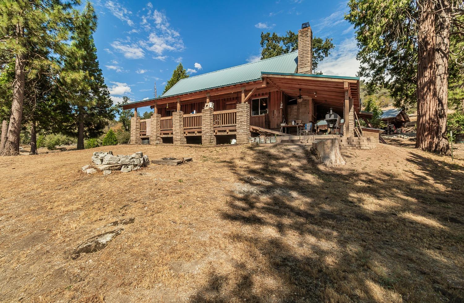 33288 Linson Road Tollhouse, CA 93667 - Photo 2 of 54 a view of a house with a yard