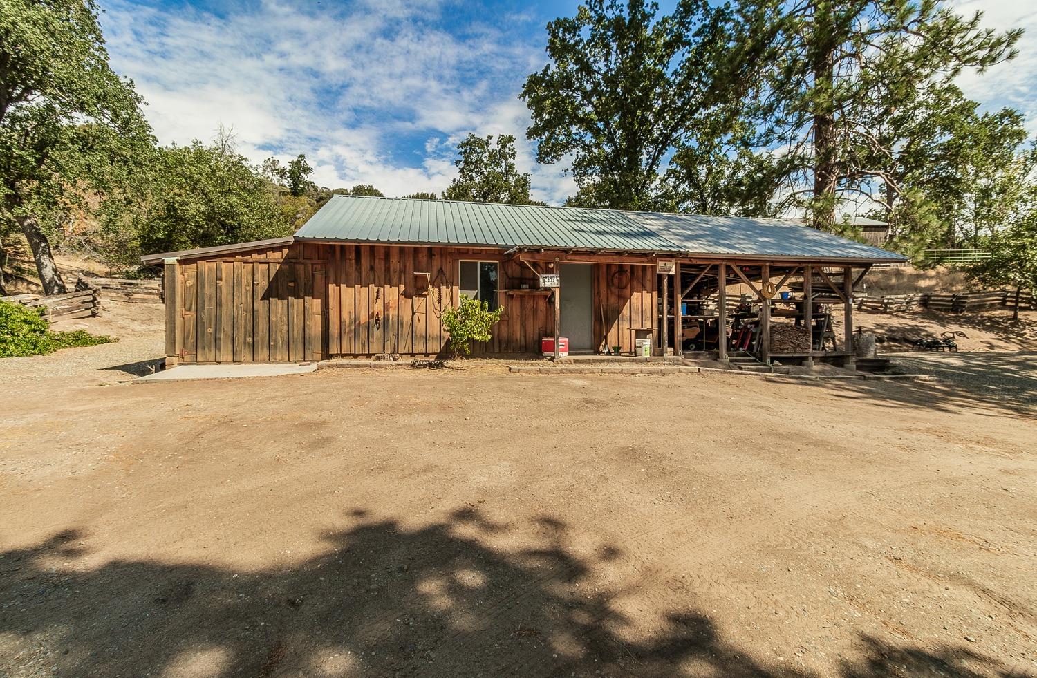 33288 Linson Road Tollhouse, CA 93667 - Photo 21 of 54 a front view of a house with a yard