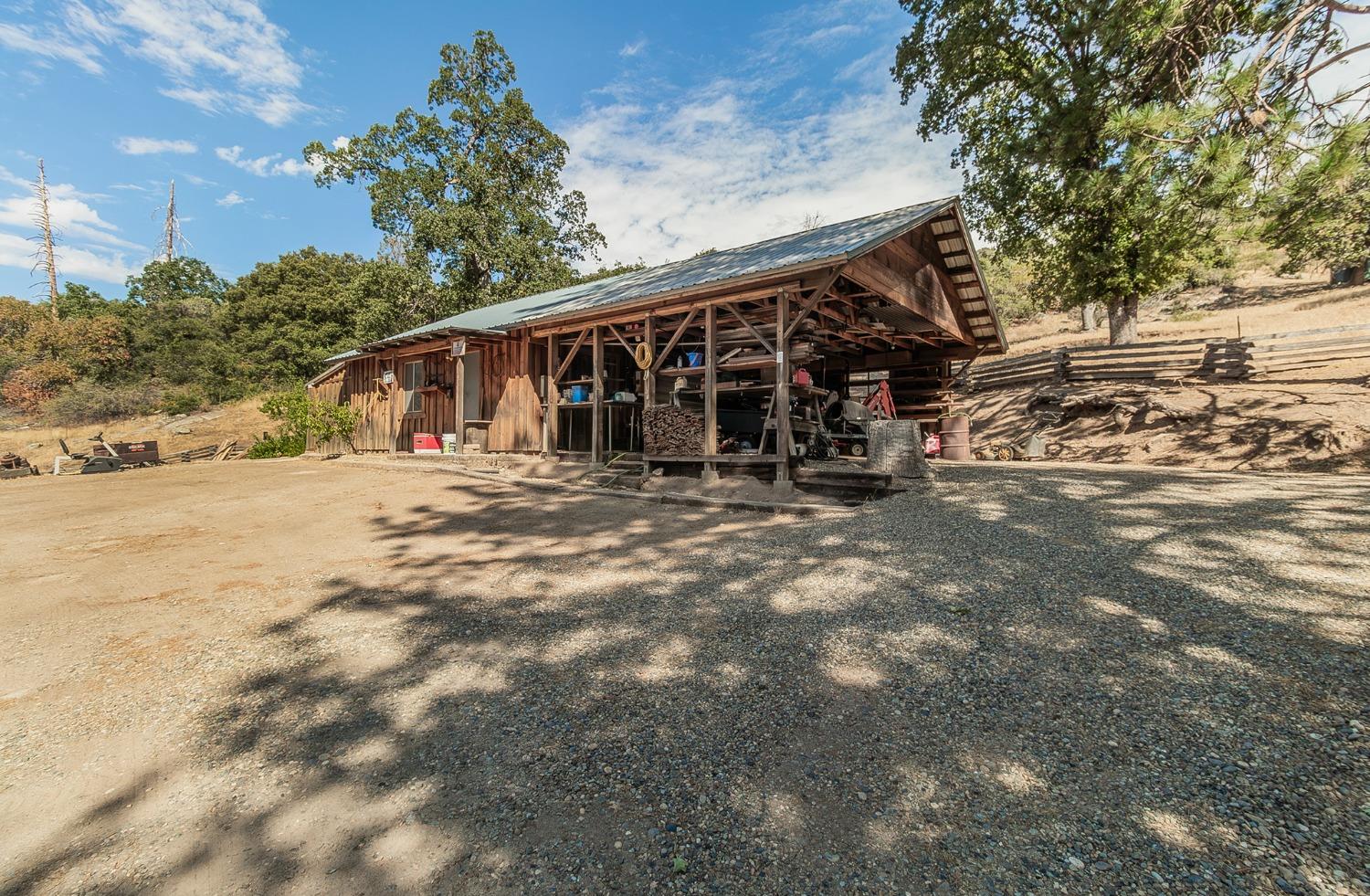33288 Linson Road Tollhouse, CA 93667 - Photo 31 of 54 a view of a house with a yard