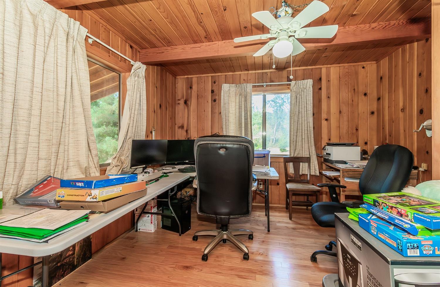 33288 Linson Road Tollhouse, CA 93667 - Photo 10 of 54 a view of a workspace with furniture and a window