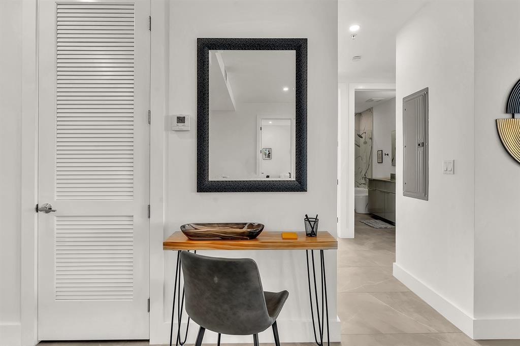 2100 Miami Road, Unit 403 Fort Lauderdale, FL 33316 - Photo 17 of 38 a bathroom with a sink and a mirror