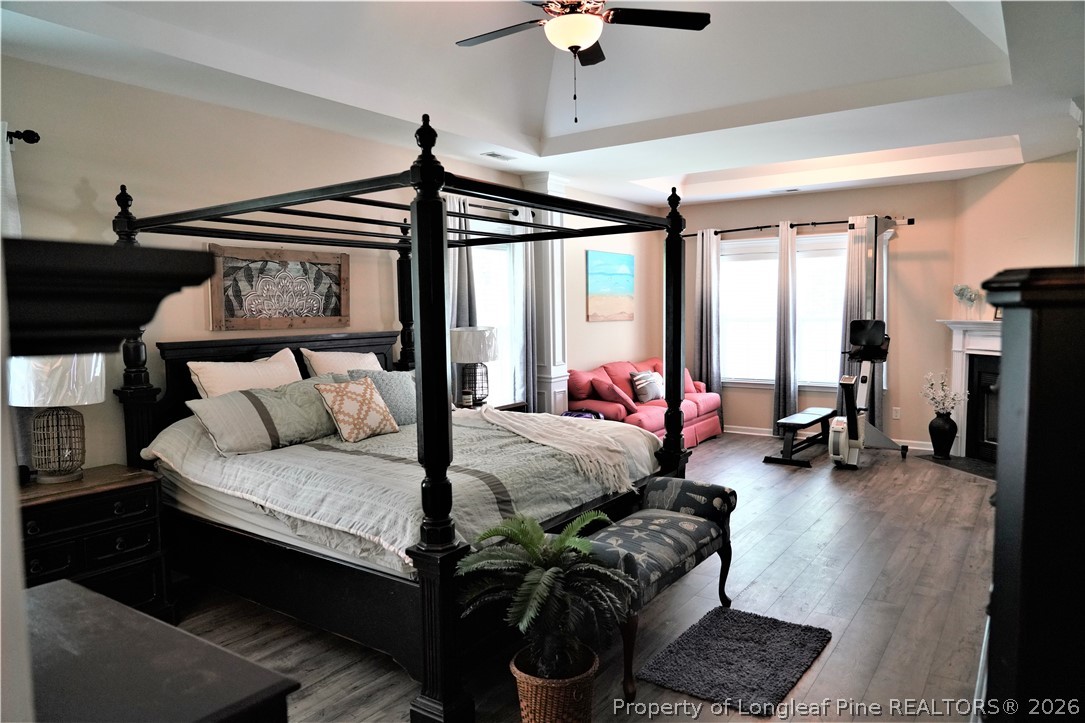 930 Old Vander Road Fayetteville, NC 28312 - Photo 23 of 45 a bed room with furniture and a chandelier
