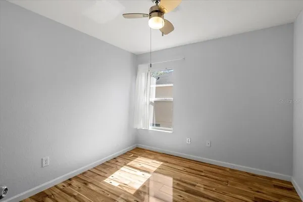 a view of an empty room and window