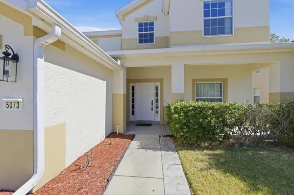 a view of a house with a small porch