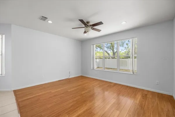 a view of an empty room with a window