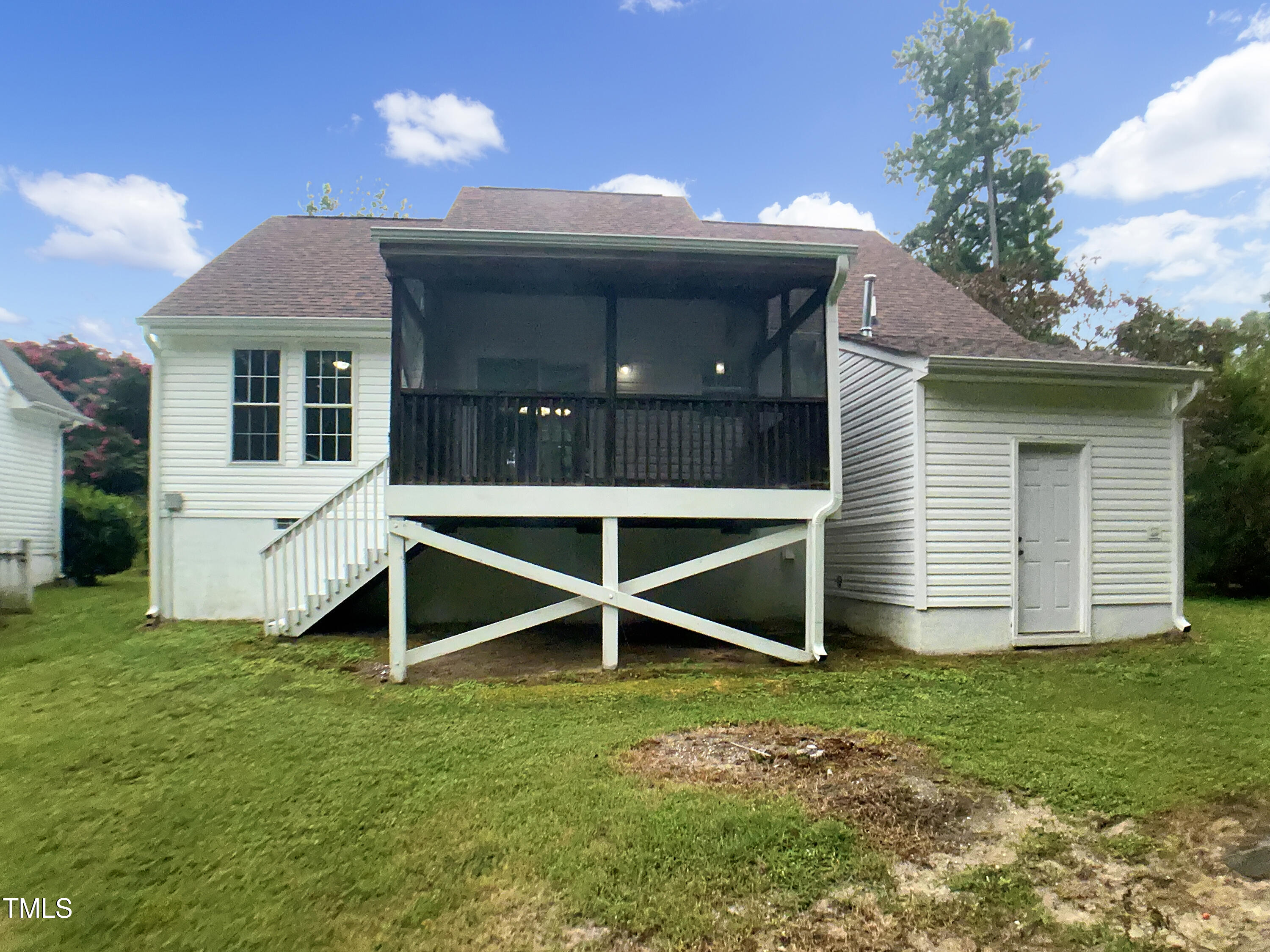 3509 Neptune Drive Raleigh, NC 27604 - Photo 8 of 18 a front view of a house with a yard