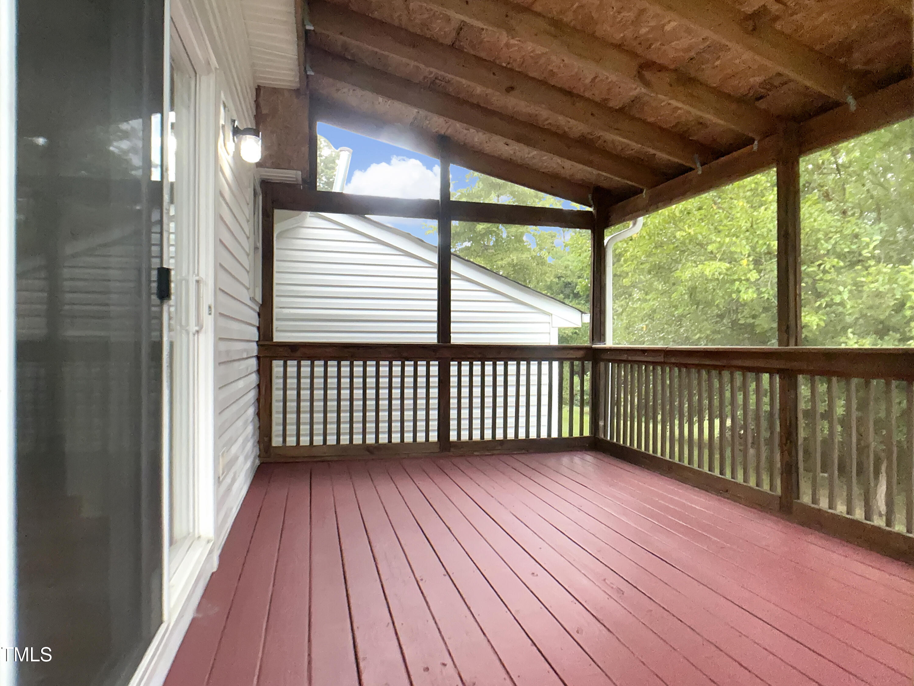 3509 Neptune Drive Raleigh, NC 27604 - Photo 9 of 18 a view of a balcony with wooden floor