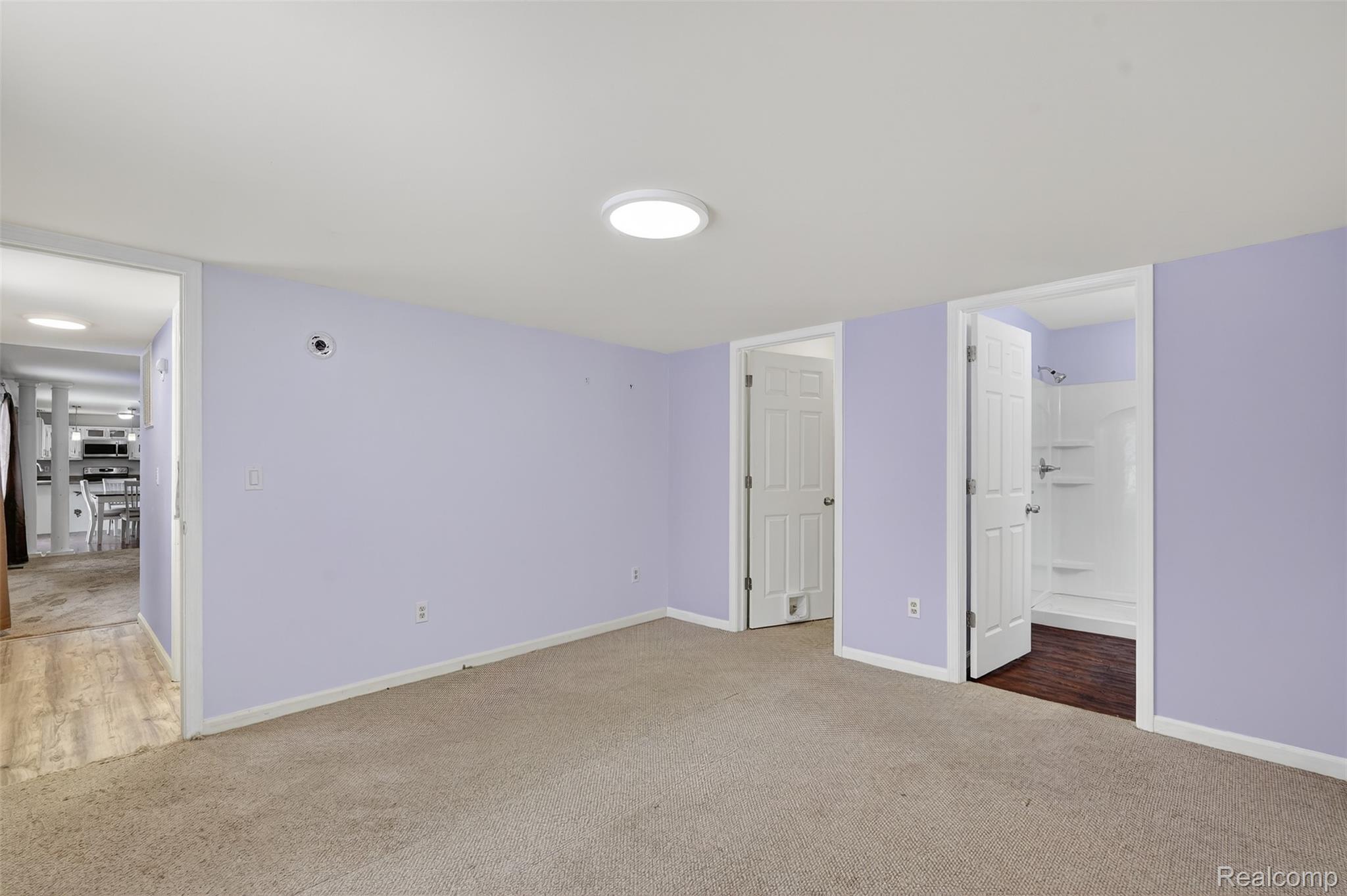 5417 Rensselear Drive Lapeer, MI 48446 - Photo 17 of 41 Unfurnished bedroom with carpet flooring and connected bathroom