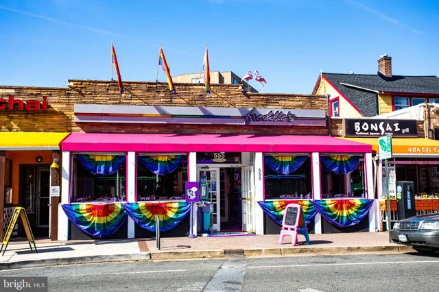 a view of street with shops