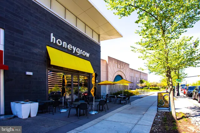 a view of a building with sitting area