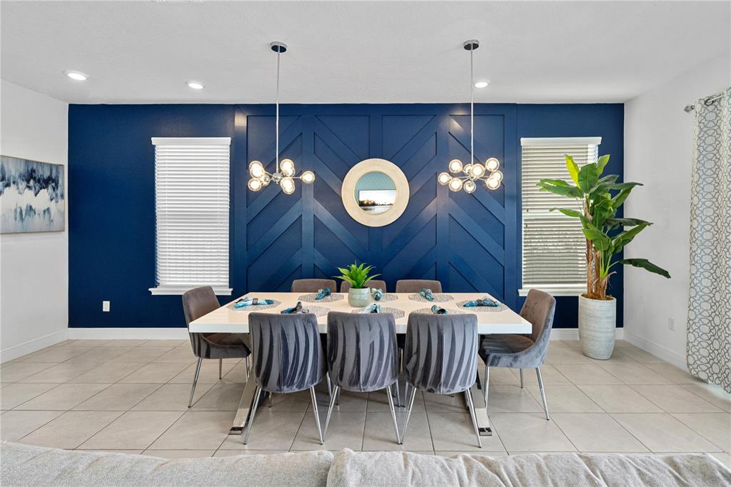7622 Excitement Drive Reunion, FL 34747 - Photo 16 of 46 a view of a dining room with furniture