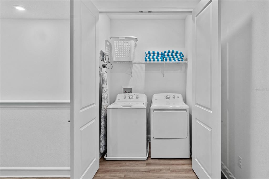 7622 Excitement Drive Reunion, FL 34747 - Photo 24 of 46 a utility room with dryer and washer