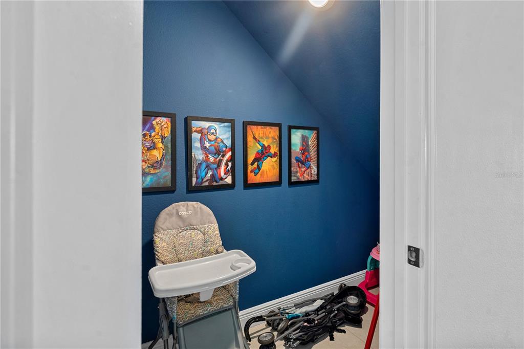 7622 Excitement Drive Reunion, FL 34747 - Photo 25 of 46 a living room with furniture and a window