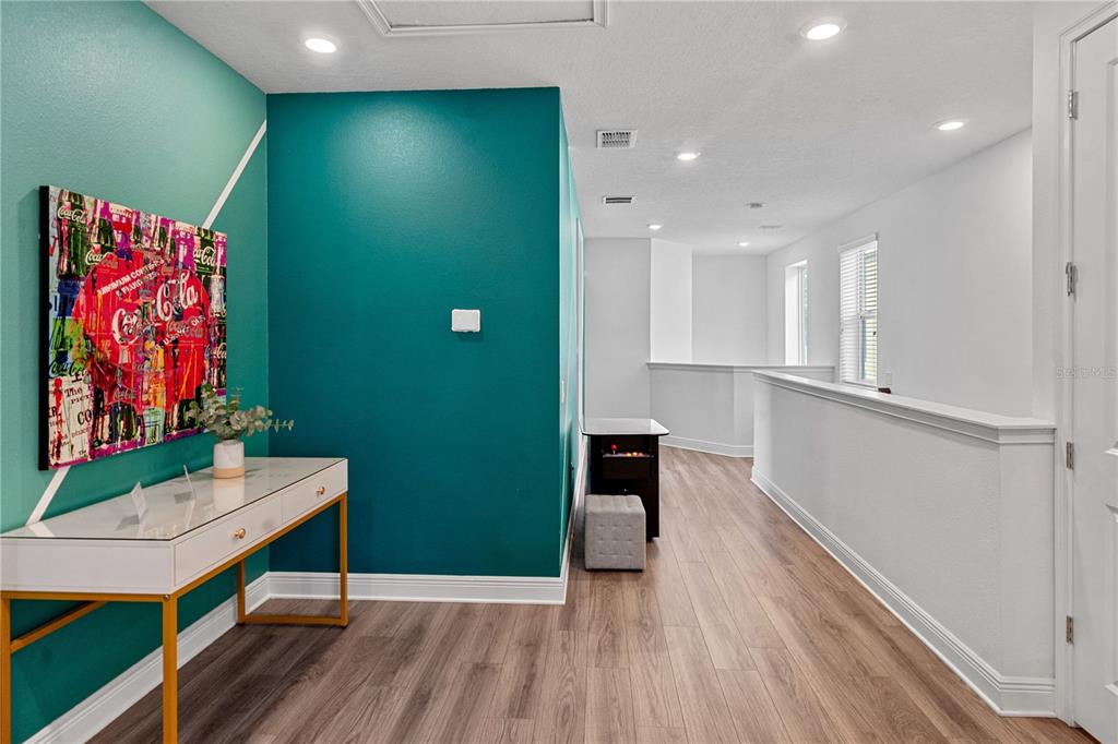 7622 Excitement Drive Reunion, FL 34747 - Photo 26 of 46 a view of kitchen with furniture and wooden floor
