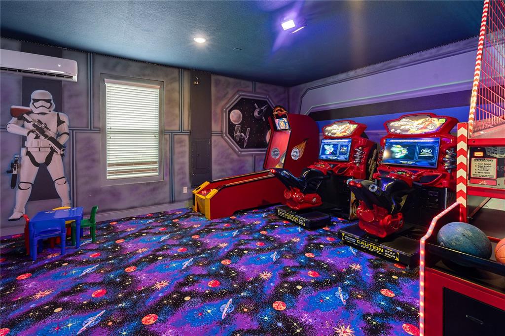 7622 Excitement Drive Reunion, FL 34747 - Photo 7 of 46 a room with lots of flowers and lots of windows