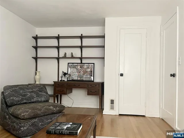 a bed room with a bed and a window