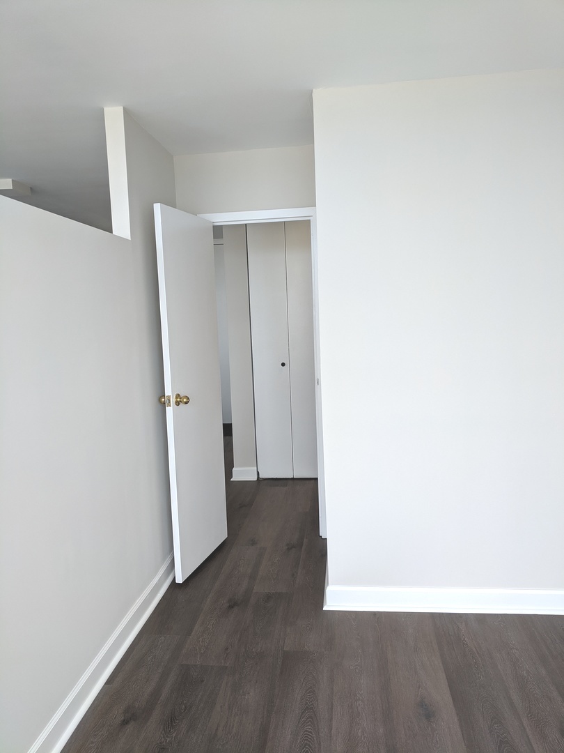 5445 North Sheridan Road, Unit 1805 Chicago, IL 60640 - Photo 10 of 12 a view of an empty room