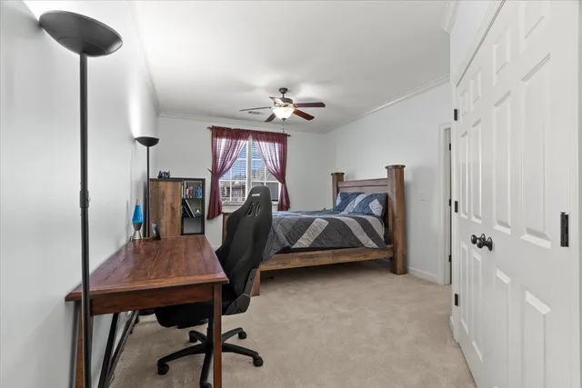 a kitchen with stainless steel appliances granite countertop a stove top oven a sink dishwasher a dining table and chairs with wooden floor