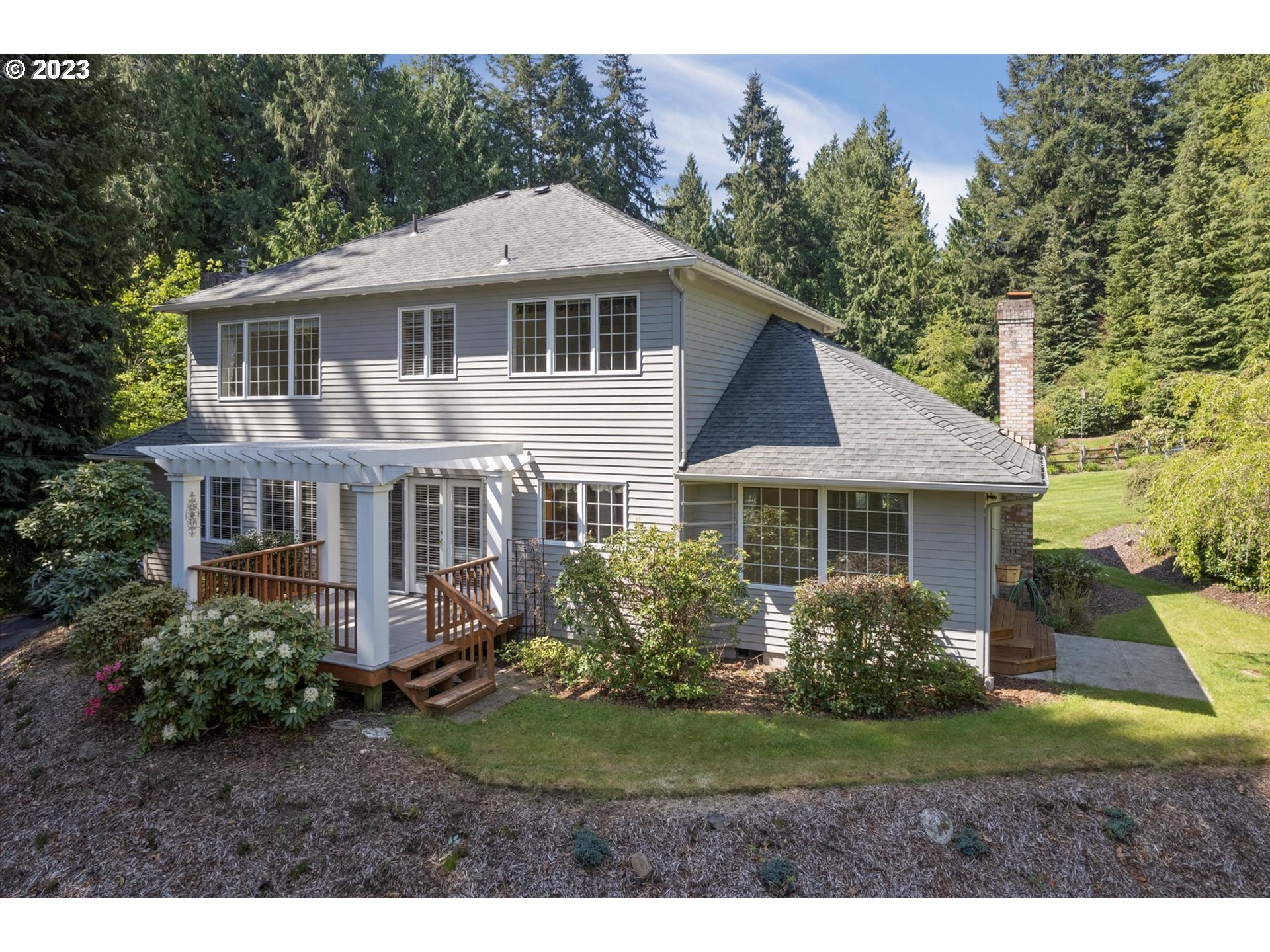 75442 Fern Hill Road Rainier, OR 97048 - Photo 10 of 48 a front view of a house with a yard