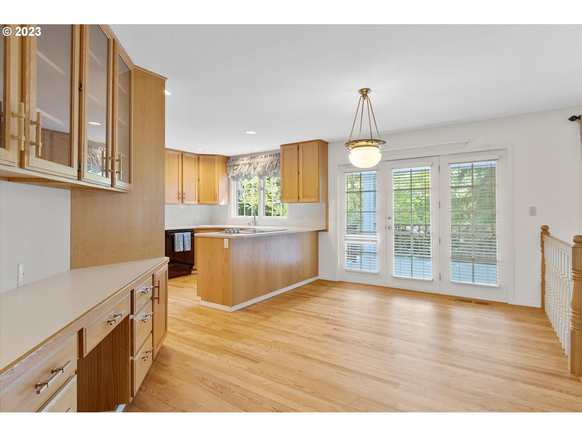 75442 Fern Hill Road Rainier, OR 97048 - Photo 24 of 48 a view interior of a kitchen with wooden floor and windows