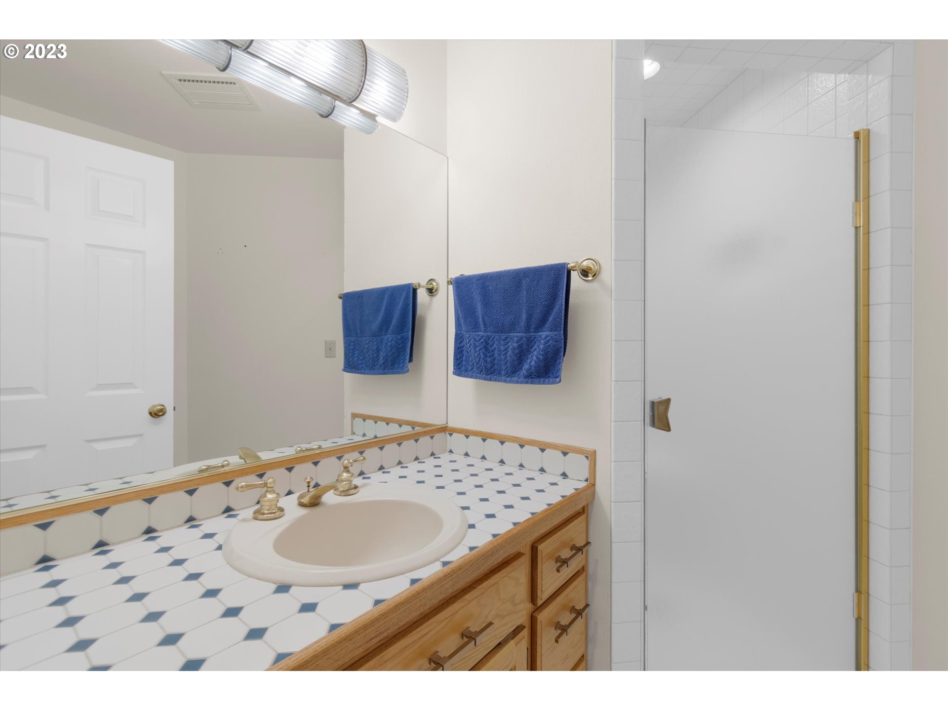 75442 Fern Hill Road Rainier, OR 97048 - Photo 40 of 48 a bathroom with a sink and a mirror