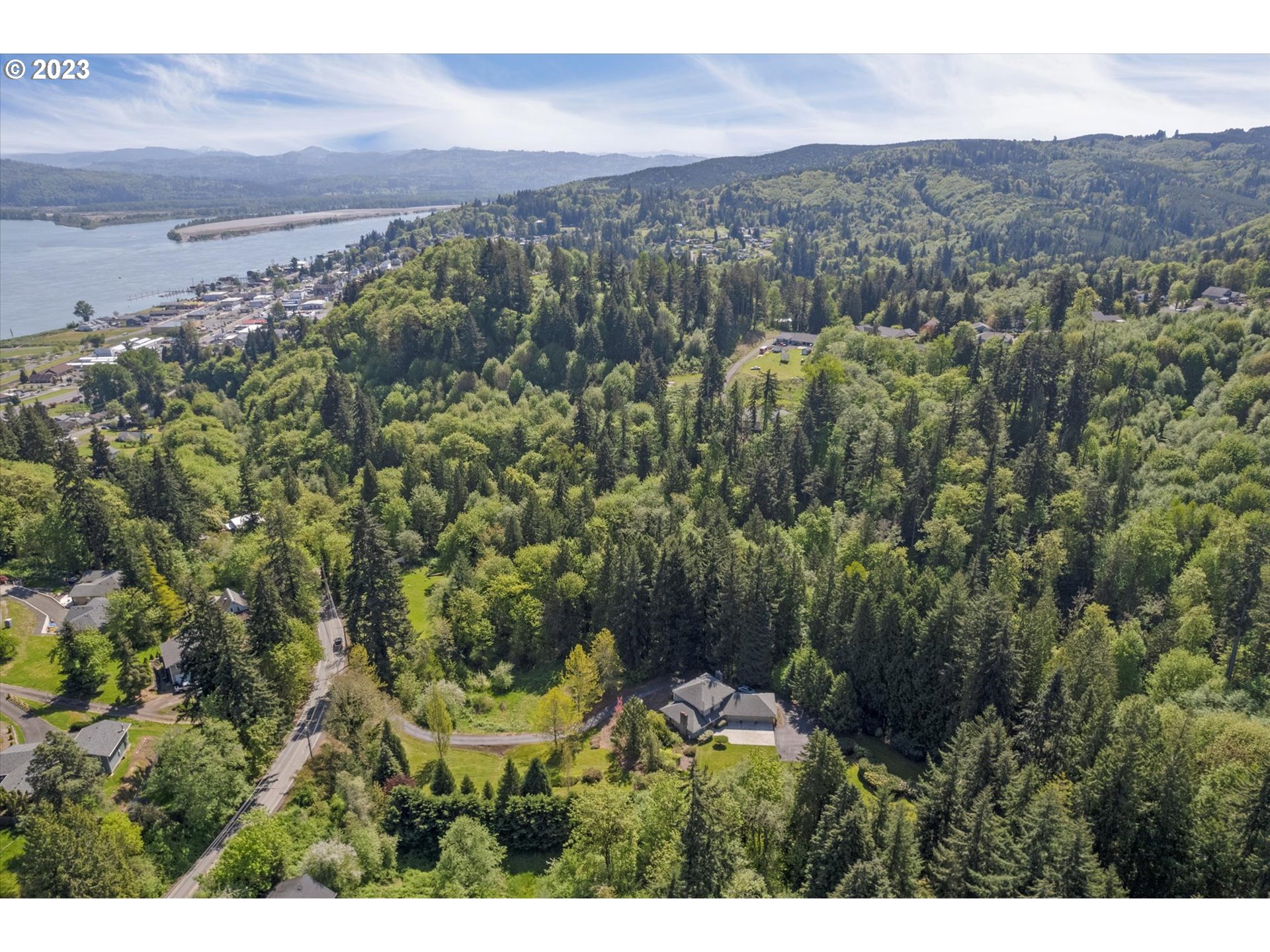 75442 Fern Hill Road Rainier, OR 97048 - Photo 46 of 48 a view of a city with lush green forest