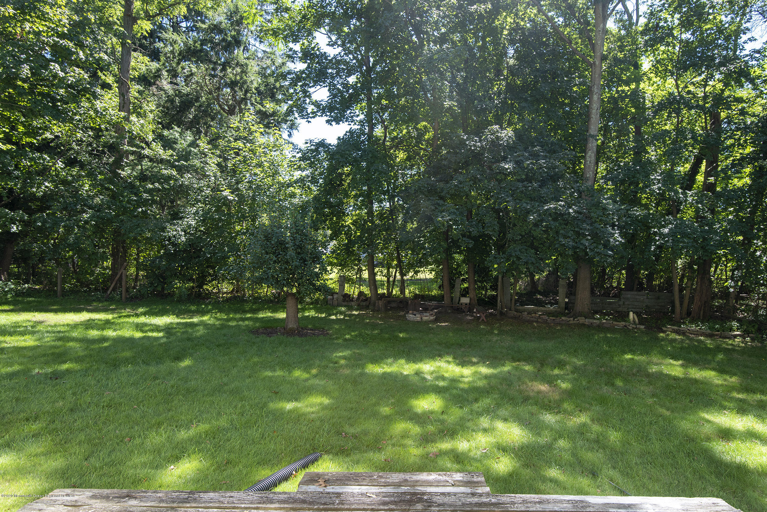 8 Goodenough Road Farmingdale, NJ 07727 - Photo 8 of 24 Back 1